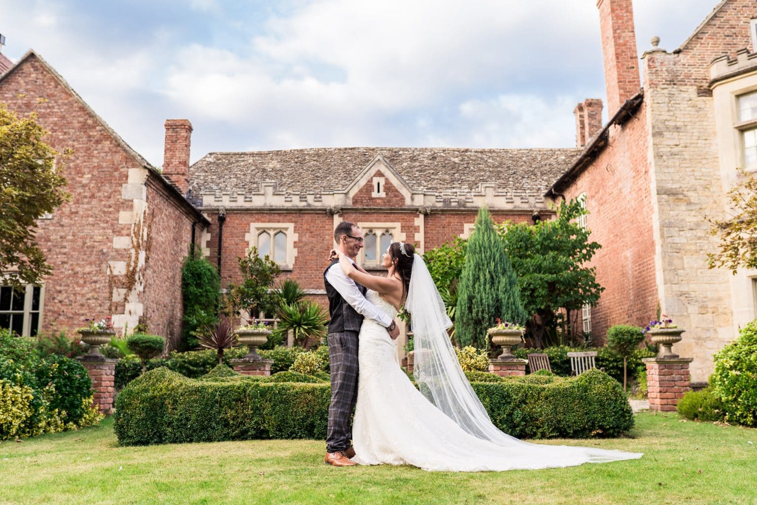 Priors Court Tithe Barn wedding portrait. Captured by Pedge Photography