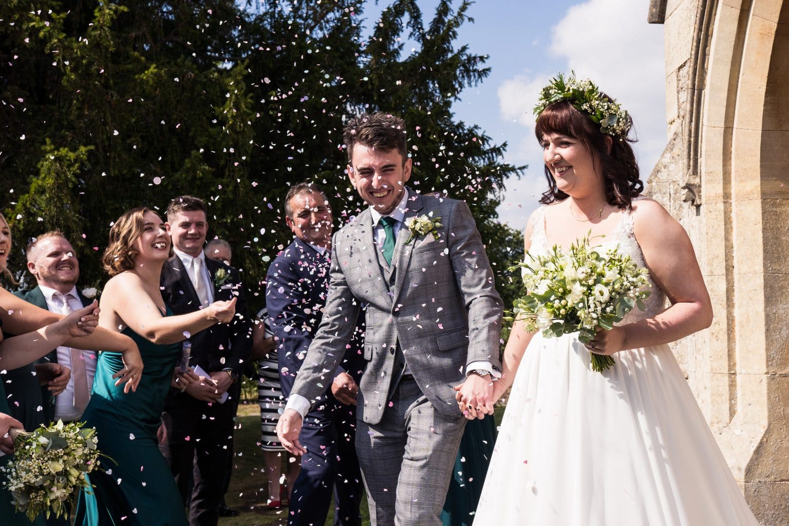 Confetti showers at this Tewkesbury wedding. Image captured by Pedge Photography