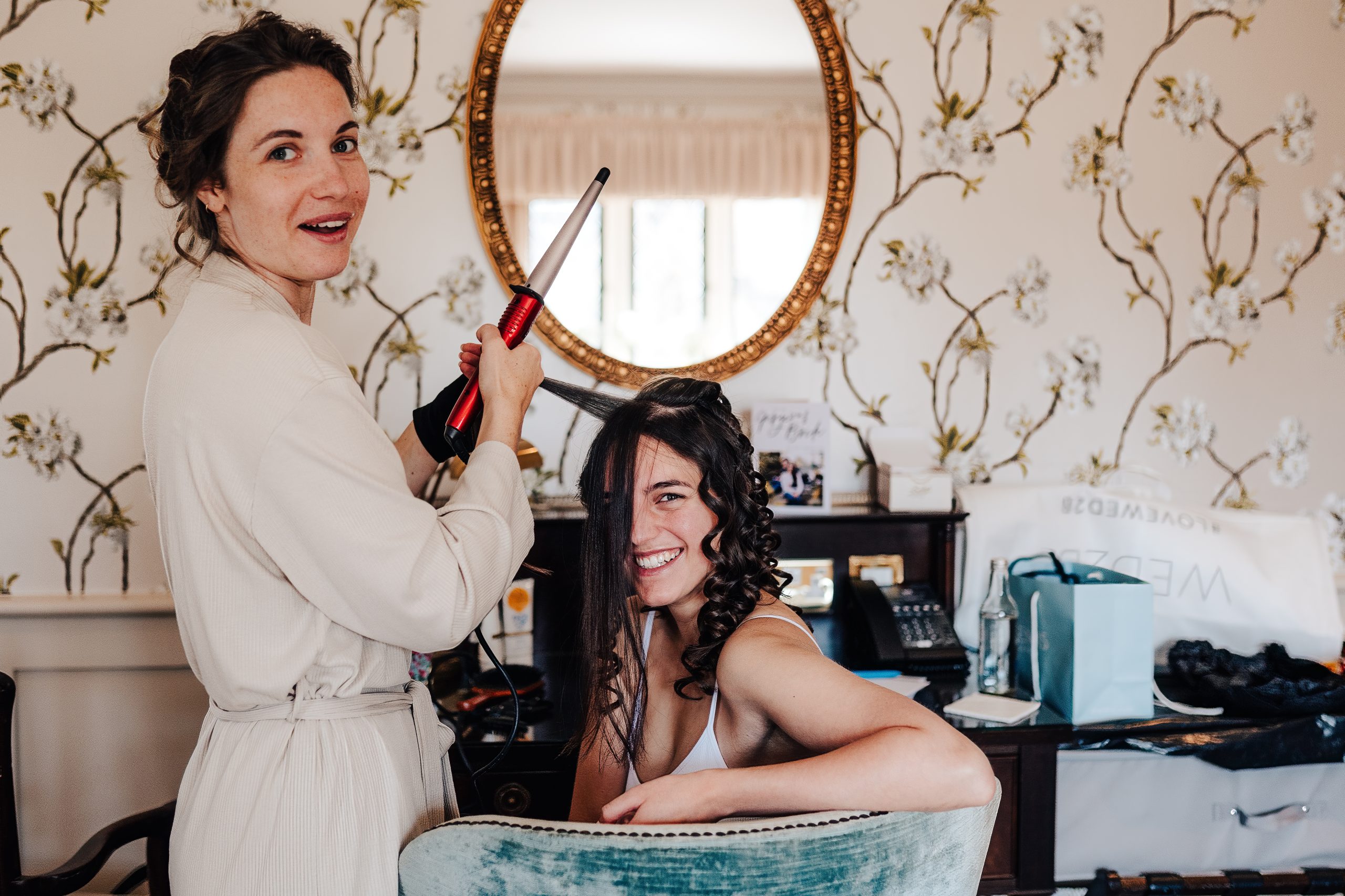 Bridal prep leads to a funny hair moment for Nina at her wedding venue Ellenborough Park Hotel