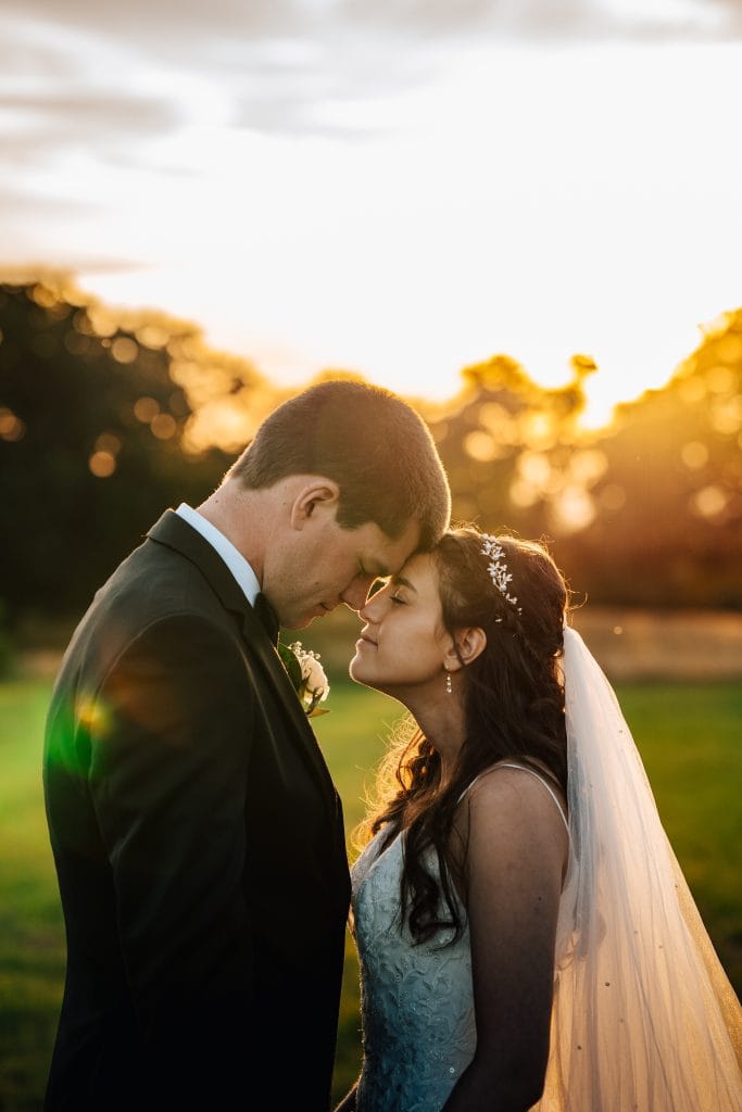 Intimate moment in the sun for this pair of newlyweds at Ellenborough Park Hotel, Cheltenham
